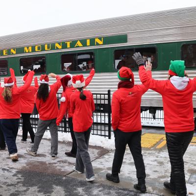 Elves waving at the train