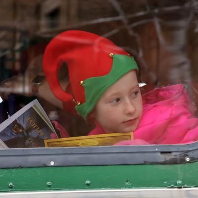 boy looking out train window
